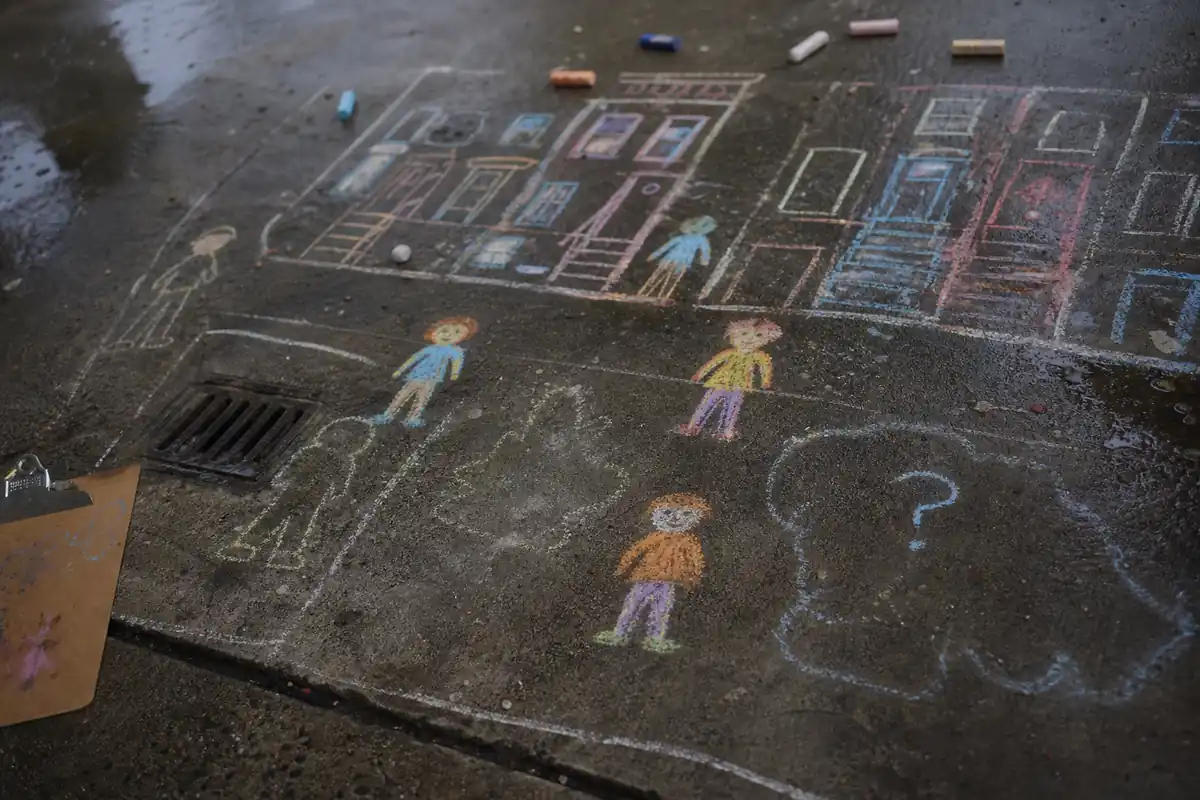 Foundry chalk-map handout: figures and uncertain outlines drawn along a Brooklyn sidewalk